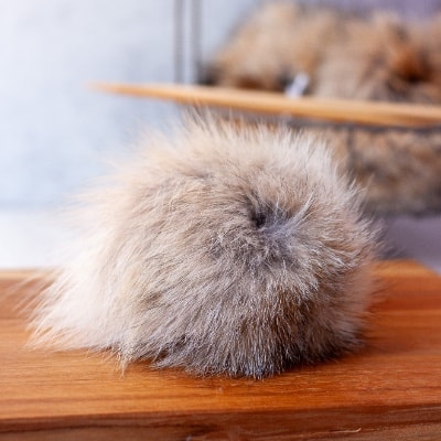 Genuine Coyote Pom Pom's